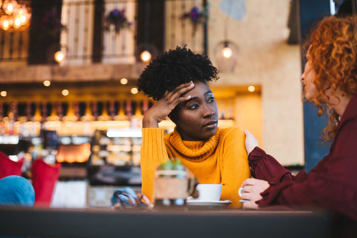 Women thinking about a One-Sided Friendship